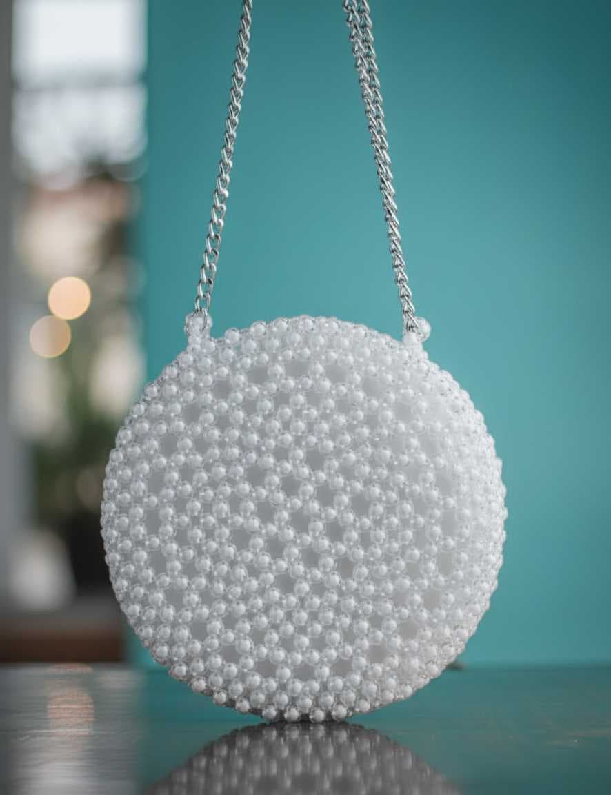 A luxurious round handbag White